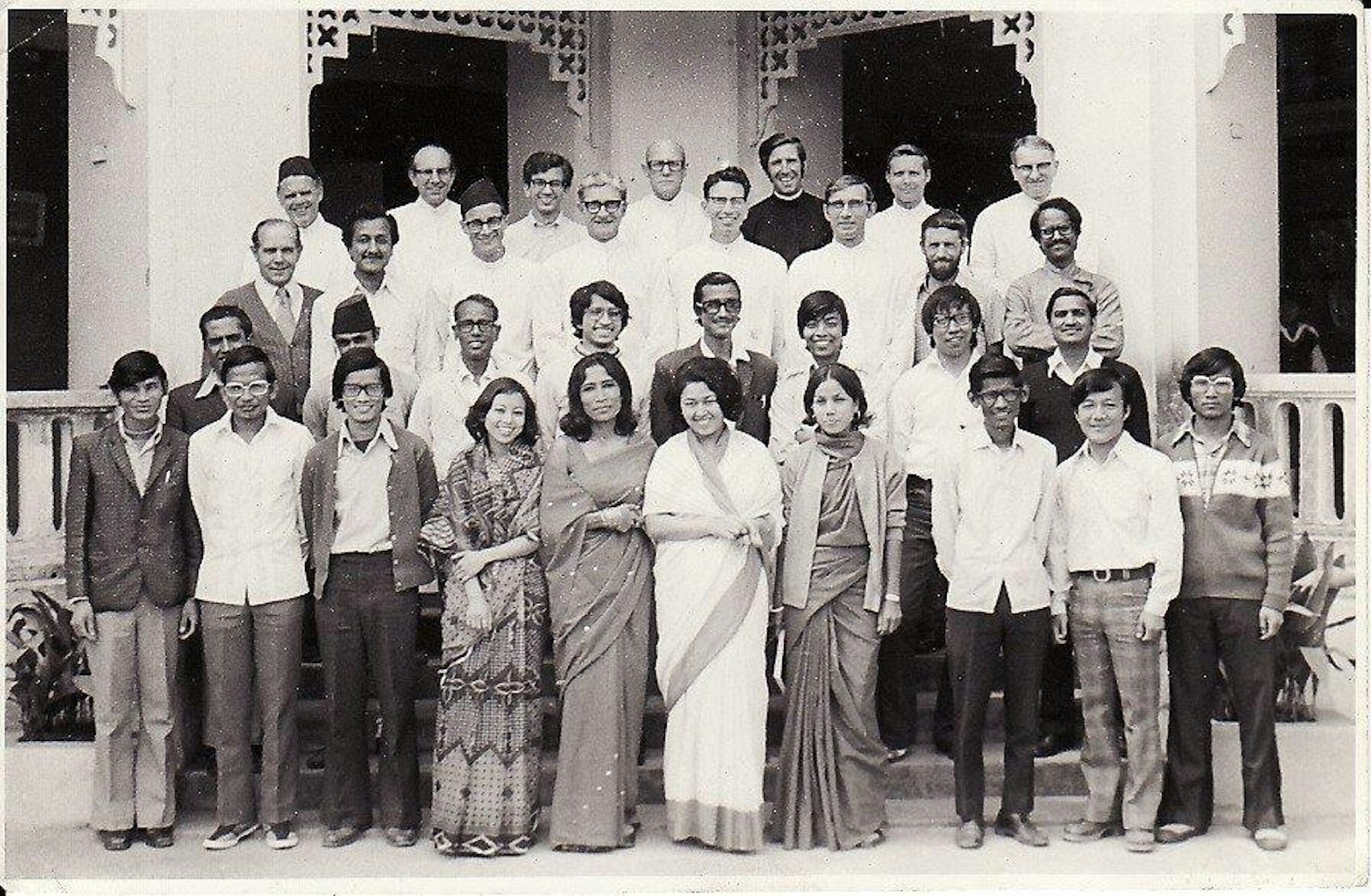Fr. Leo Cachat, SJ, is pictured with locals at St. Xavier's School in Godavari, Nepal, where he taught, in 1977. (Courtesy of Fr. Leo Cachat, SJ)