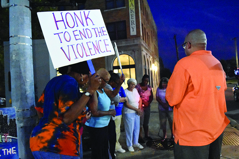 Parishioners from several Detroit parishes gather on the corner of Gratiot and McClellan avenues on Detroit’s east side Aug. 25 to pray for peace, an effort organized by the Archdiocese of Detroit’s Office of Black Catholic Ministries.