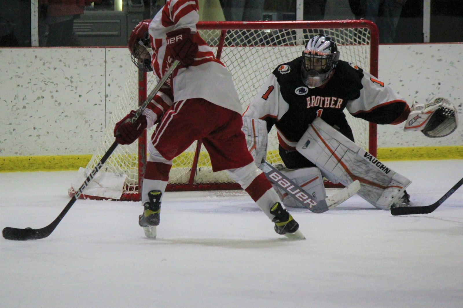 Brother Rice goaltender Tommy O’Donnell prepares to block a backhand shot by Jack Brunell in the third period of Orchard Lake St. Mary’s 2-0 win Jan. 11 at the St. Mary’s Athletic Complex.